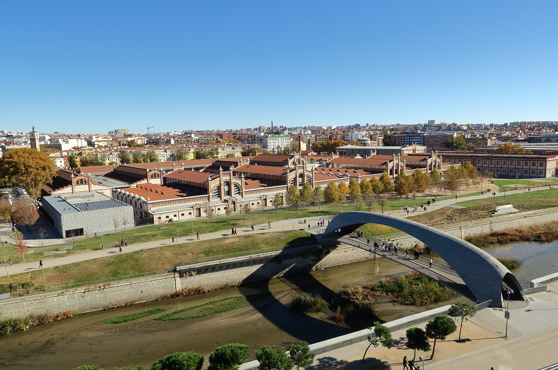 Matadero Madrid and the river footbridge seen from Madrid Río, photographed in November 2017.